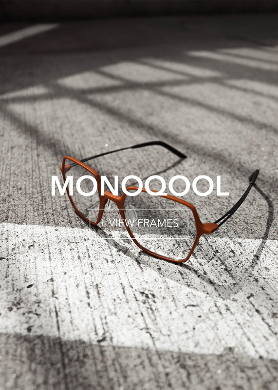 monoqool-final1_3 Angular orange and black eyeglasses on textured concrete. Text: MONOOQOOL, VIEW FRAMES.