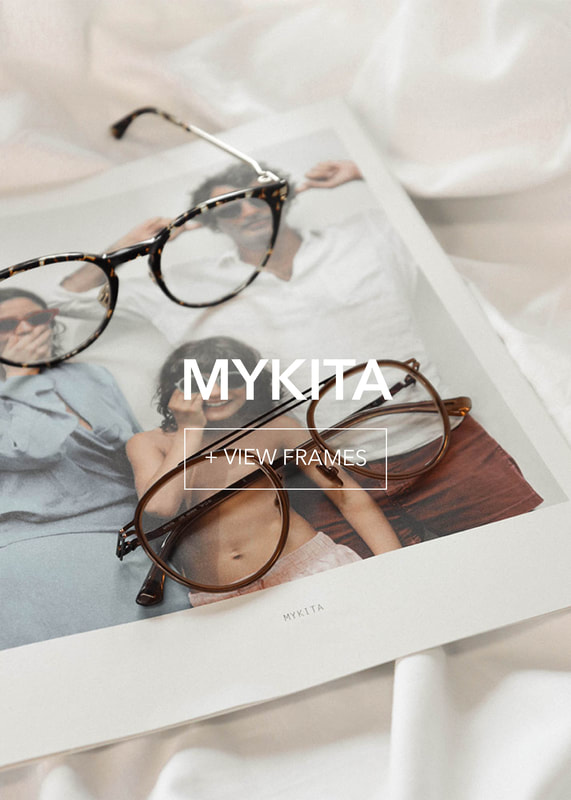 mykitafinal-final1_3 MYKITA: Tortoiseshell and round brown glasses on an open magazine.